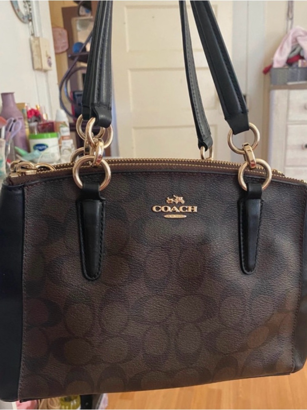 Coach Brown Signature Canvas Shoulder Bag with Black Handles and Gold Hardware